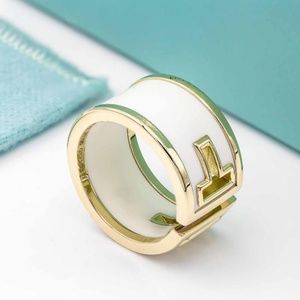 Tiffany & Co. Yellow Gold and White Ceramic Band